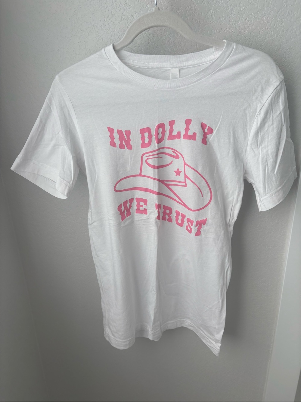 Bella Canvas White Tee with Pink 'In Dolly We Trust' Graphic
